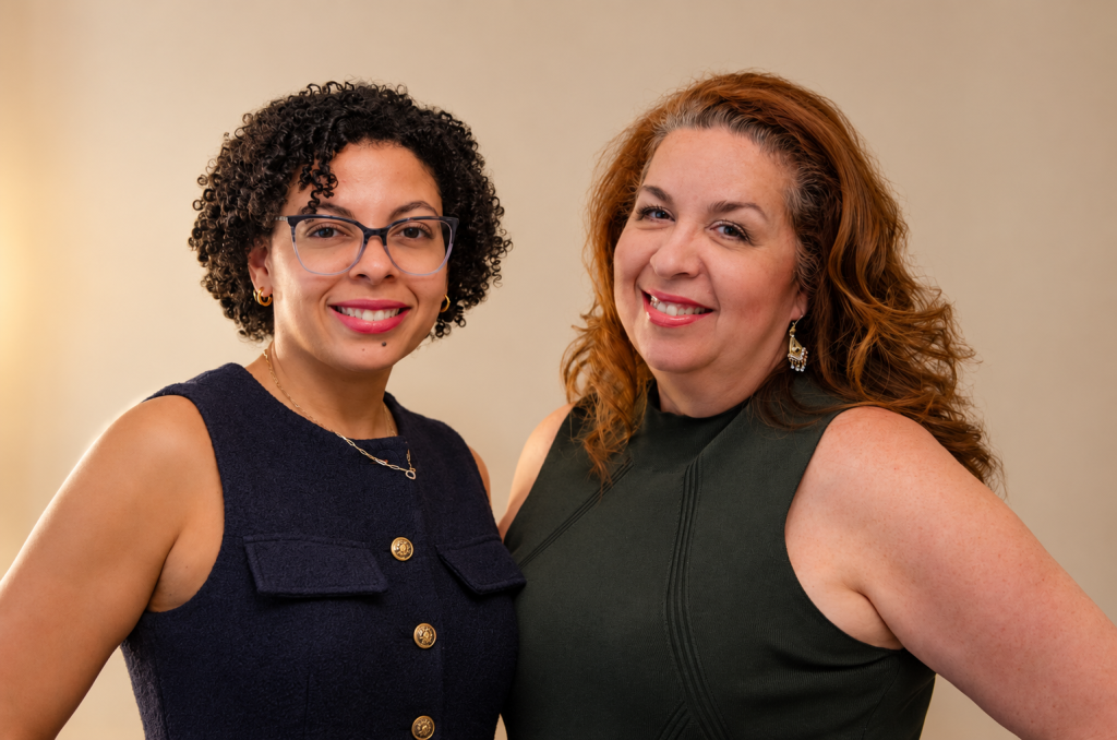 Liza-Marie and Liza, the mother-daughter founders of Hydrangea & Hue Elegant Events, smiling together in a professional portrait.